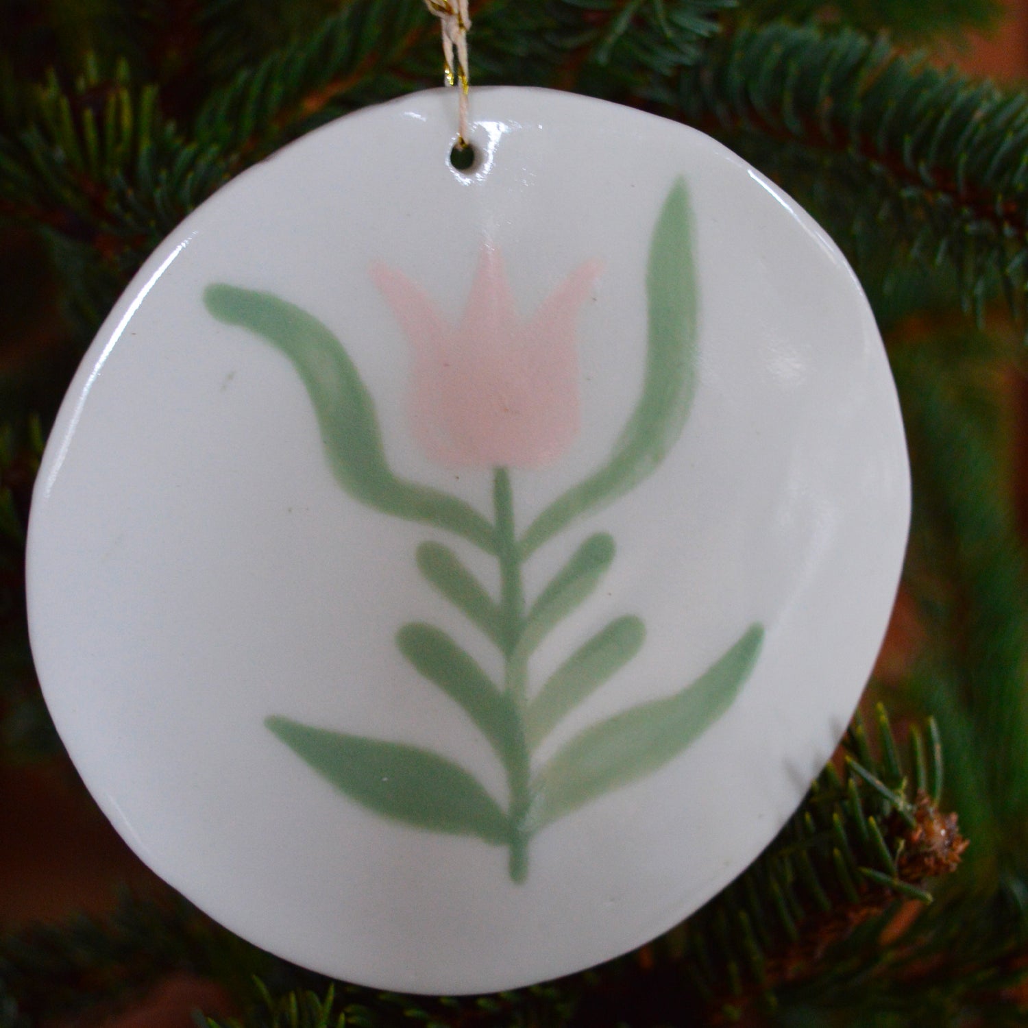 Décoration de Noël, suspension ronde en porcelaine avec motif de fleur, vert et rose, fabriquée en France
