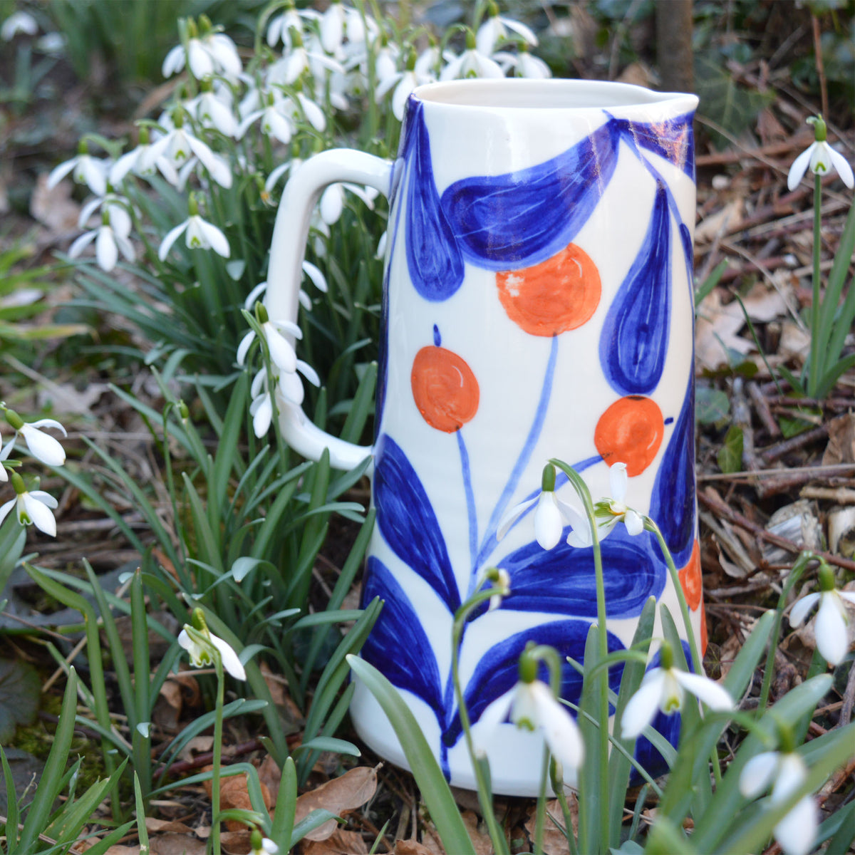 Carafe en porcelaine, fabriquée en France artisanalement, motif floral et coloré