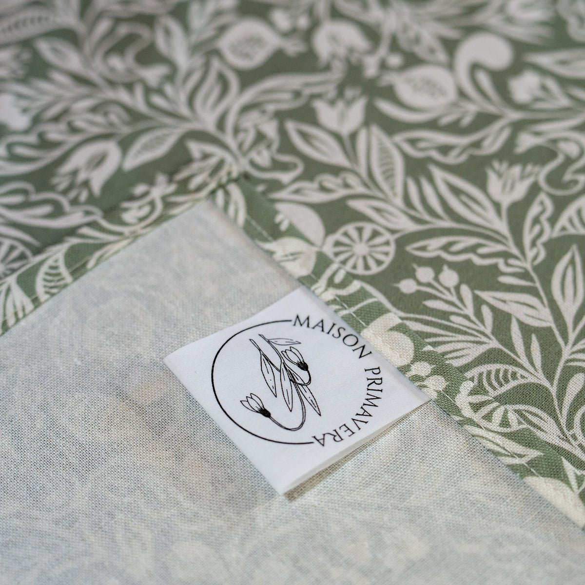 Etiquette de torchon fabriqué en France, en coton et lin, motif floral, vert et blanc, polychrome Alsace