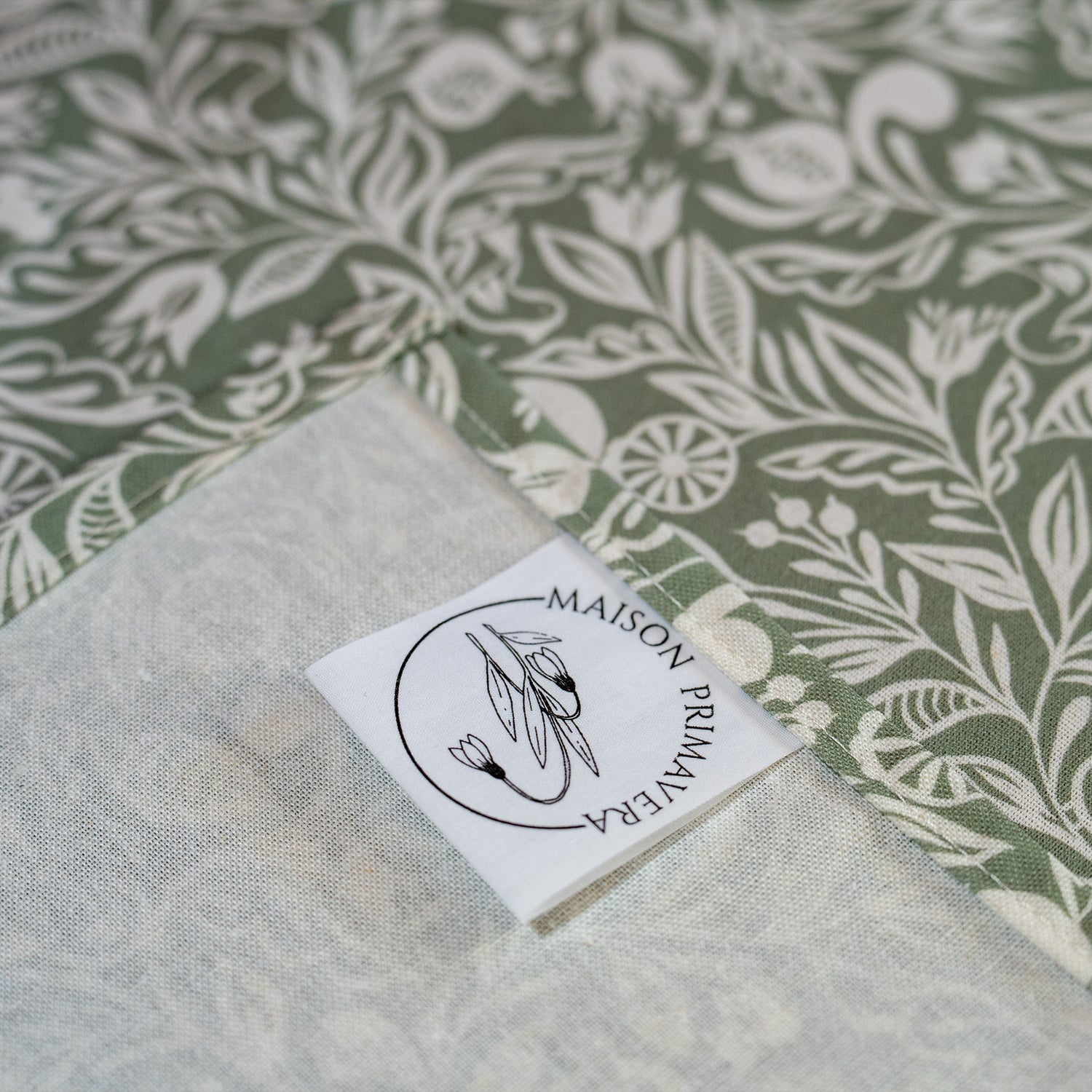 Etiquette de torchon fabriqué en France, en coton et lin, motif floral, vert et blanc, polychrome Alsace